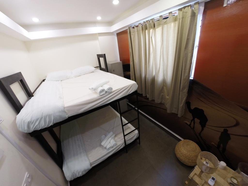 Aura Thematic Hostel Phnom Penh Værelse billede